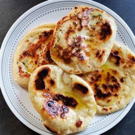 Place the cheese dough into a mixing bowl with the rest of the ingredients except for the butter and parsley. Campervan Recipe | Very easy naan bread | Vanlife Eats