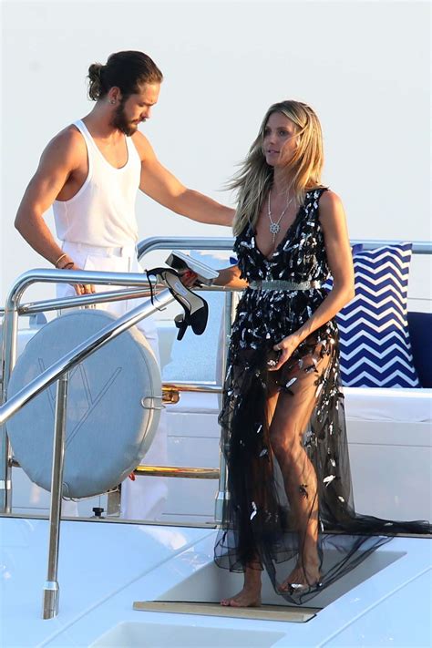 We start to follow the adventures of the. Heidi Klum on a yacht in Sardinia -08 | GotCeleb