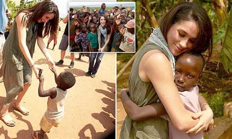 Personally, i find the cradling a bit like those signs in the back of cars: Meghan Markle is praised as a 'true humanitarian' | Daily ...