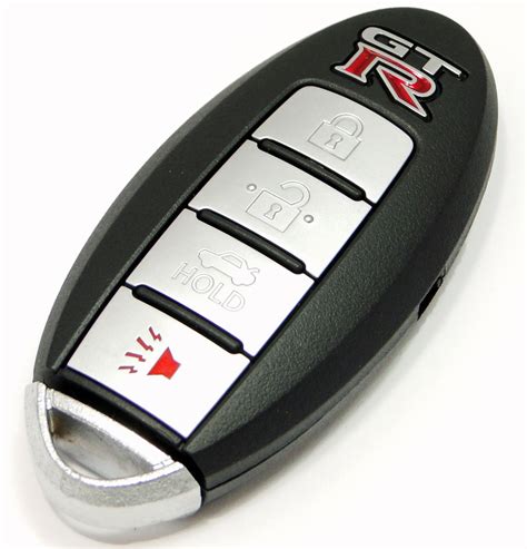 The metal blade key can be used to manually open the driver's door or the trunk. 2009 Nissan GTR GTR Remote Keyless Entry key fob ...