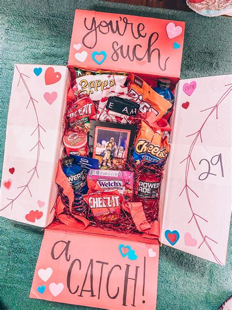 We have 40 first valentine's day gift ideas for channeling new love without making it weird. Homemade Valentine's Day Goodie gift box with snacks and ...