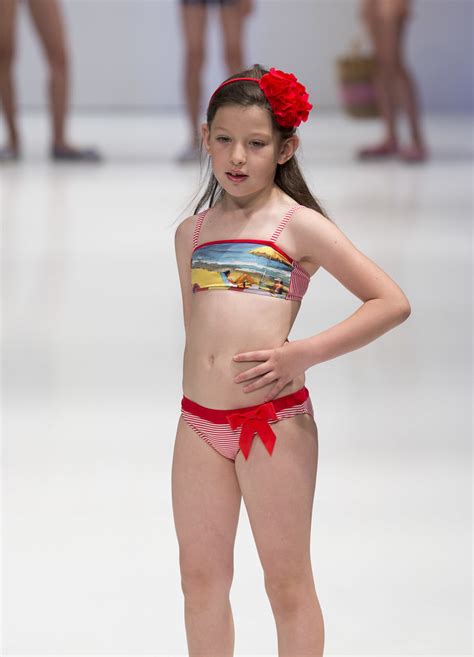 One piece swimsuits and sling bikinis. DC KIDS | Salida DC Kids en FIMI FASHION SHOW. FIMI 77 ...