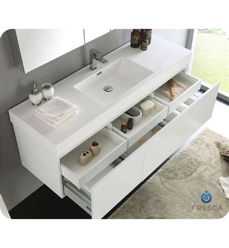 It not only looks fantastic, it can be easily adapted to fit whatever space you have available. Fresca FVN8041WH Mezzo 59" White Wall Hung Single Sink ...