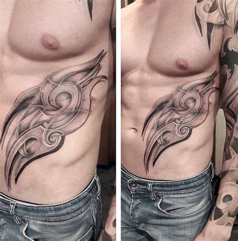 This is an amazing art with amazing 3d effect. Top 40 Best Tribal Rib Tattoos For Men - Manly Ink Design ...