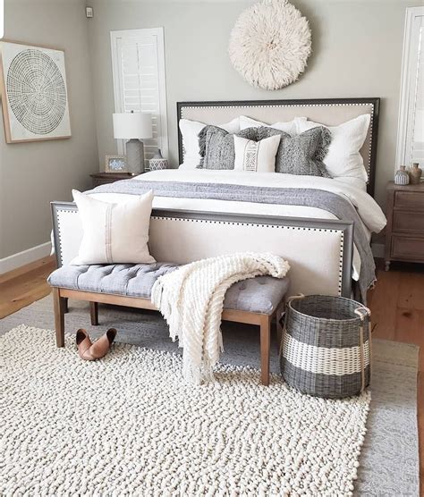 The accent wall with photographs and the ceiling with a dash of teal highlight the colour palette further. Love this tone on tone #gray #bedroom with tons of texture ...