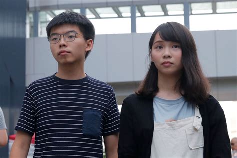 Agnes chow (l), ivan lam (c), and joshua wong (r) arrive at the west kowloon law courts building on nov. Hong Kong pro-democracy group says Joshua Wong arrested