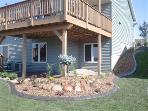 Patios can actually cost much less than decks when built at or near ground level! Neat idea for the backyard | Deck landscaping, Backyard ...