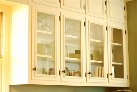 26 diy ideas to update kitchen cabinets without replacing them. Between Blue and Yellow: Kitchen Update-Glass Cabinets!