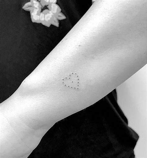 Badass tattoo designs simple on wrist for men and girls that look good. Dot heart tattoo on the wrist. | Heart tattoo, Minimalist ...