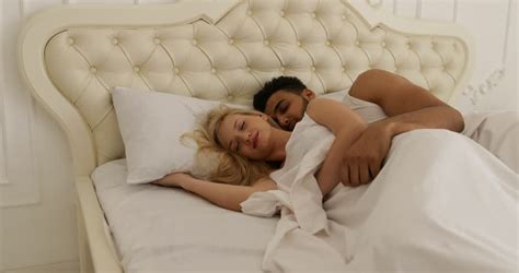 Haz tu selección entre imágenes premium sobre couple kissing bed de la más alta calidad. Couple Sleep Lying On Bed Man Hug Woman Home White Modern ...
