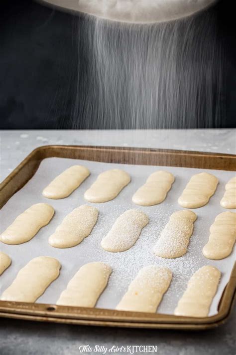 Ladyfingers are made from a sponge cake batter where the egg yolks and sugar are beaten together until very thick and then flour and beaten beaten egg . How to Make Lady Fingers Cookies - This Silly Girl's ...