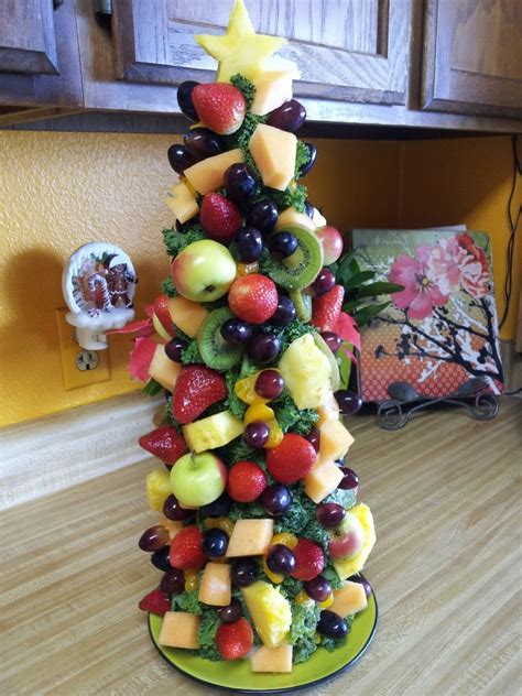 It was so popular that it's basically become his signature dish. The Fruity Fresh Christmas Tree my daughter and I made for my office potluck. Yummm! | Christmas ...