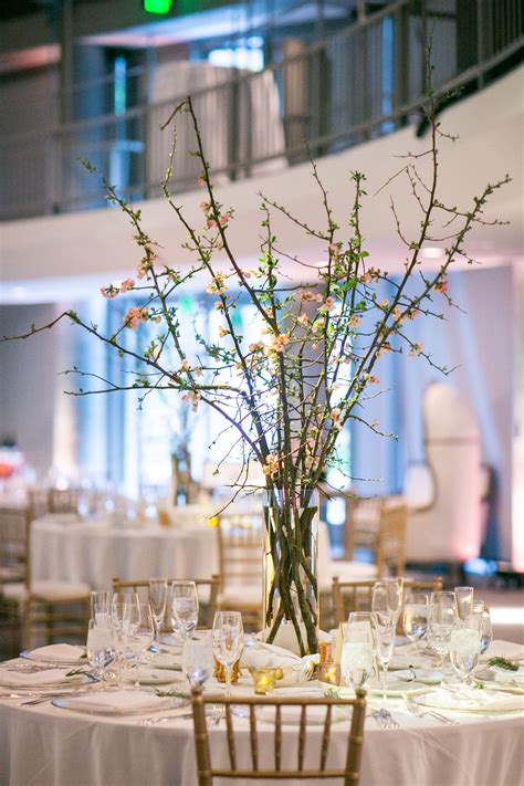 Tall Centerpieces with Branches | Tall centerpieces, Branch centerpieces, Real weddings photos