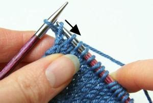 Well after complaining at how much it hurt to get stuck with the needles i tried to get them out. Knitting backwards