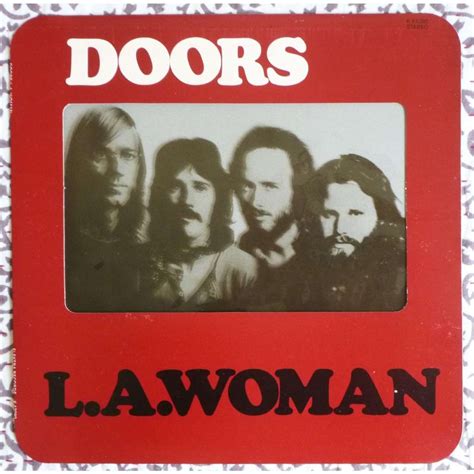 Drive thru your suburbs into your blues. La woman ( rare see through window cover ) by The Doors ...
