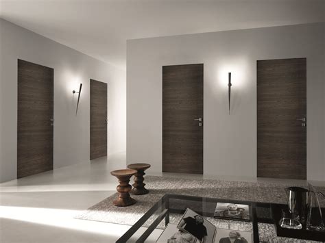 They are the perfect addition for door decor in commercial properties. BISYSTEM Flush-fitting door by GAROFOLI