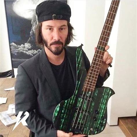 Welcome to keanu reeves online. Keanu Reeves with his Matrix bass guitar (Credit- Rockifi ...