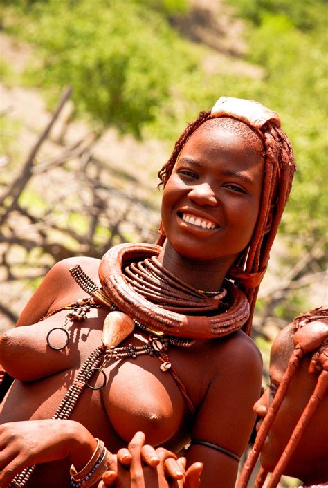 Share the best gifs now >>>. A beautiful Himba woman from northwestern Namibia, Africa awaits her turn to participate in a ...