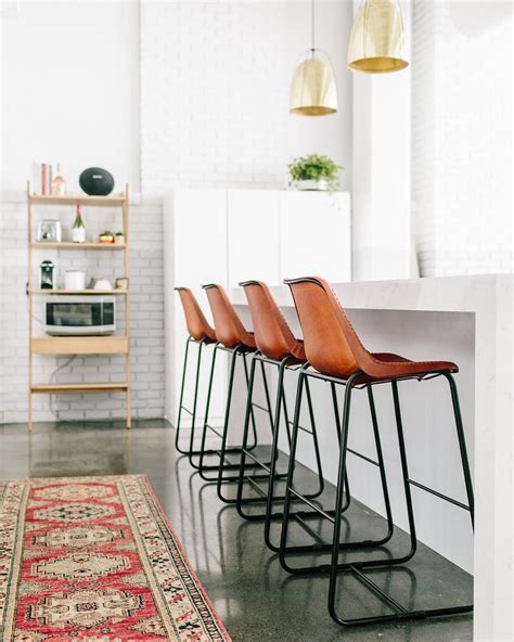 Choose from elegant bar stools, striking counter stools, and versatile low stools from leading design brands, including, blu dot, kartell, gubi and emeco. rug from @francesloom | Apartment decor, Leather bar stools