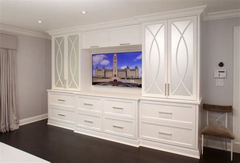 Storage towers on top of custom made night stands with counter tops and upper valance. JWH in Realtor Magazine - JWH Design & Cabinetry