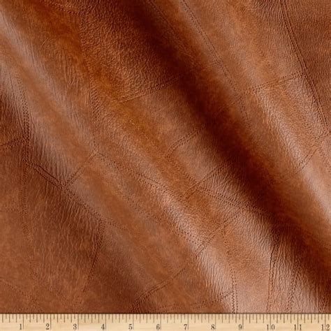 Find a wide selection of upholstery fabrics for sale to revamp your furniture, including linen, cotton, polyester, leather, wool and damask fabric designs. Faux Leather Patchwork Rawhide - Fabric.com | Leather ...