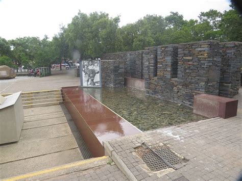 The image shows the world famous photograph by sam nzima of hector being carried away from the scene of his fatal shooting by the apartheid regime in soweto, 1976. Hector Pieterson Memorial (Soweto) - Tripadvisor