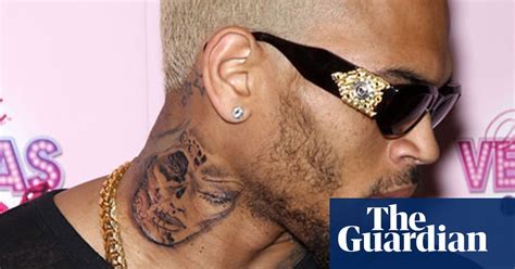 Rihanna gets tattoo of the word 'breezy' to mark herself as a permanent member of team breezy. Chris Brown's new tattoo is sickening | Music | The Guardian