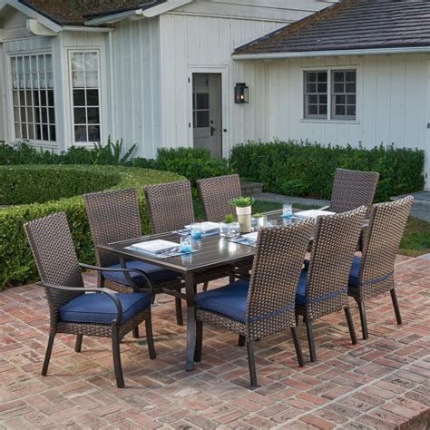 Crafted with rubberwood solids, this set is designed with a removable leaf and trumpet legs. Royal Garden Anacortes 9-Piece Aluminum Outdoor Dining Set ...