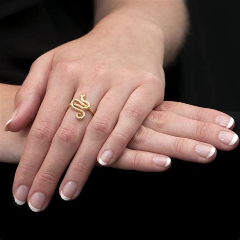 Beryuan 7pcs women dainty gold ring set rhinestone butterfly white gem stone knuckle ring set gift for her cute ring set women and girls teens jewelry rings size 6 7 3.1 out of 5 stars 270 1 offer from $8.66 Stunning Yellow Gold Kew Snake Ring - London Road Jewellery