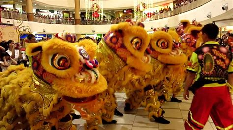 On the first day and second day of cny, aquaria klcc went live on facebook to perform the underwater lion dance. CNY 2013 Lion Dance at Metro Sengkang Compass Point - YouTube