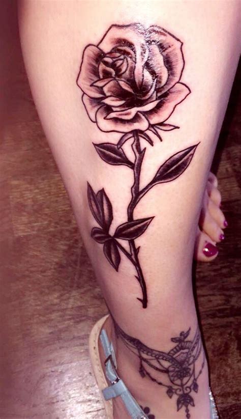 Cool tattoos with roses on arm. Rose stem tattoo | Rose stem tattoo, Flower tattoo ...