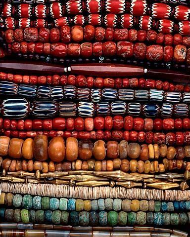 Blue, black, and red bead ornament. Afrikaanse kralen #costumejewelryandtradebeads | African ...