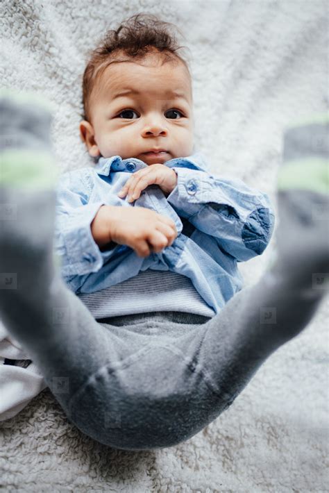 Finding cute little boy haircuts for your toddler shouldn't be hard. Photos - Cute toddler on bed 121335 - YouWorkForThem