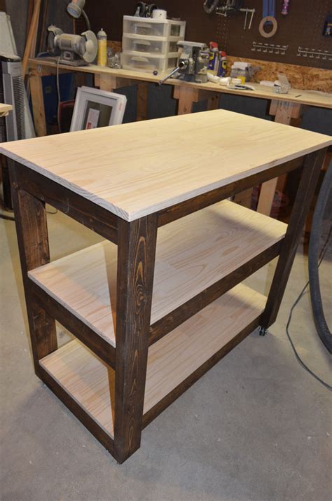 Maybe you would like to learn more about one of these? Remodelaholic | Build a Wood Bar Cart DIY