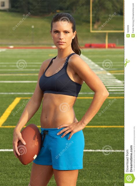 The women in sports book series by multiple authors includes books women in the olympics, greatest moments in women's sports. Young Woman In Sports Bra Holding Football With Hand On ...