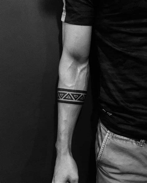 Many cool and sleek arm band tattoo images can be found on the internet fort those who just need it for style. View 23+ Attractive Simple Hand Band Tattoo Designs