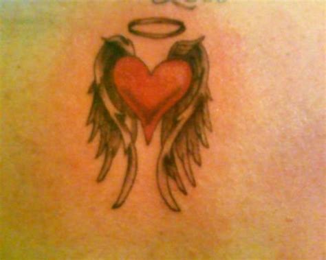 The meaning differs from design to people wear an archangel tattoo because they believe that the angel would protect them against all the odds; Angel Heart Wings | tattoos :) | Pinterest