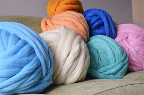How much bulky yarn to make a blanket? How much Yarn to Arm Knit a Blanket, Full Chart Included Here