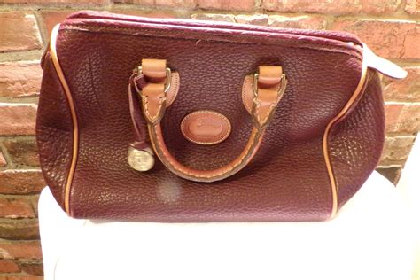 Raspberry come with coach gift receipt prove authentic fold over snap closure 3 full bill compartment 4 credit card. Vintage Dooney and Bourke All Weather Leather Handbag ...