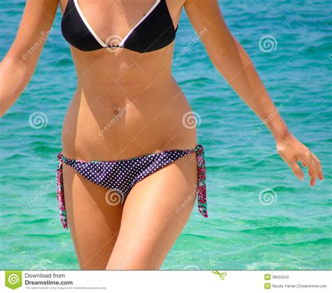 This represents perhaps the most complete picture of the most common names in the united states. Body Of A Lady Wearing Swimming Suit On The Beach With ...