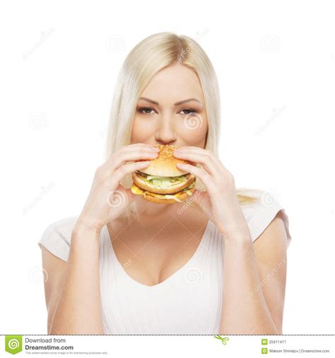 Each dollar spent equals one point. Portrait Of A Young Blond Woman Eating A Burger Stock ...