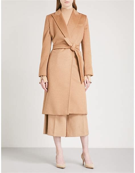 Zara serves up a classic, affordable iteration of the camel coat. Max Mara Seoul Camel Coat | Angelina Jolie's Camel Coat ...