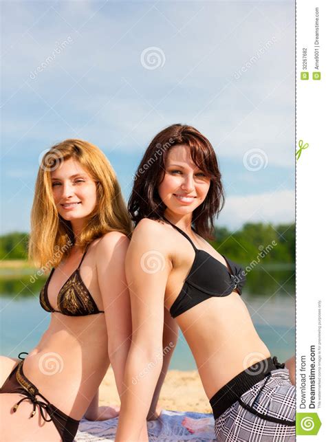 How to have fun meeting women. Two Happy Women Having Fun At Lake In Summer Stock ...