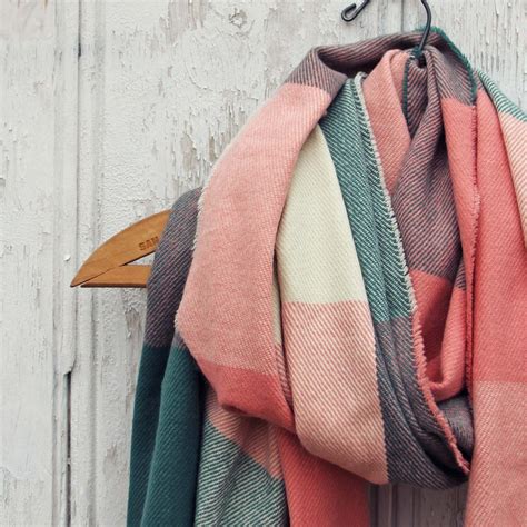 Capture great deals on stylish women's scarves & wraps from hermès, burberry, coach & more. The Lodge Plaid Scarf in Peach, Cozy Knit Scarves from ...