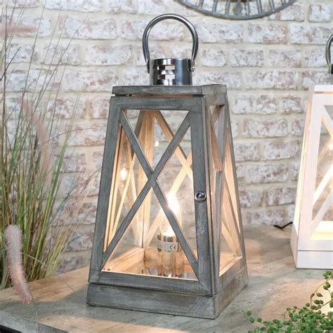 This set of two lamps has two lights each. Grey Wooden Lantern Style Table Lamp in 2020 | Wooden ...