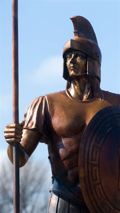 By analogy with the ancient spartans, who famously possessed these qualities. UNCG Spartan Statue Swag