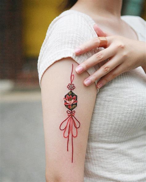 Are tattoos illegal in korea. 15 Beautiful Tattoo Ideas Lotus norigae made by in South ...