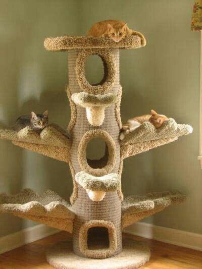 Take one plywood round and attach four 2x4s to 2. ...cat tube using quik tube | Cat tree, Cat furniture, Cat diy