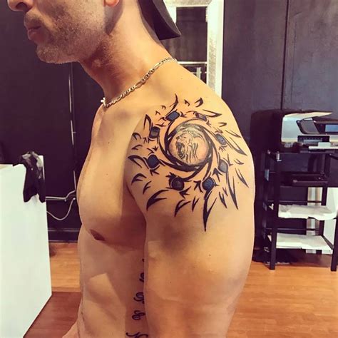 Symbolic warrior tribal armband tattoo. 50 Amazing Sun Tattoo Ideas with Great Symbolic Meaning ...