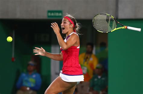 The first ever female olympic medallist from the. Monica Puig Makes Olympic History, Winning Puerto Rico's ...